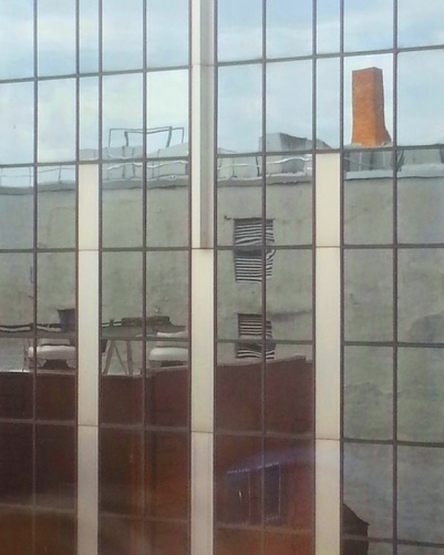 University of Pittsburgh building reflected in glass windows