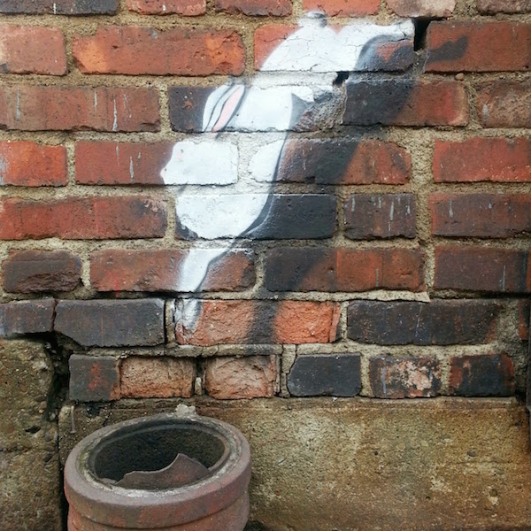stencil graffiti of rabbit jumping, Pittsburgh, Pa.