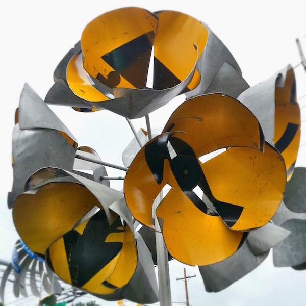 flower sculpture made from highway detour roadsigns, Meadville, PA