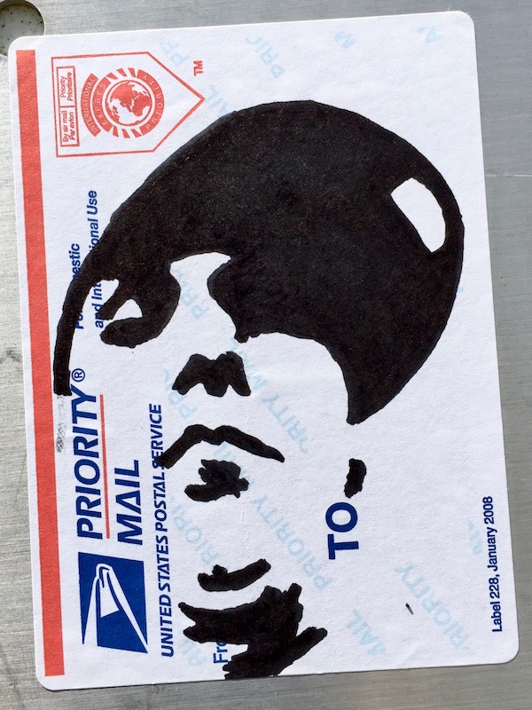 US postal service priority mail sticker with black ink portrait of man with baseball cap, Pittsburgh, PA