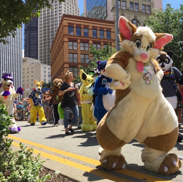 parade marchers in fursuits including large rabbit, Anthrocon 2017 Fursuit Parade, Pittsburgh, PA