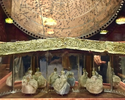 ornate disk player with dancing ballerinas display at DeBence Antique Music World