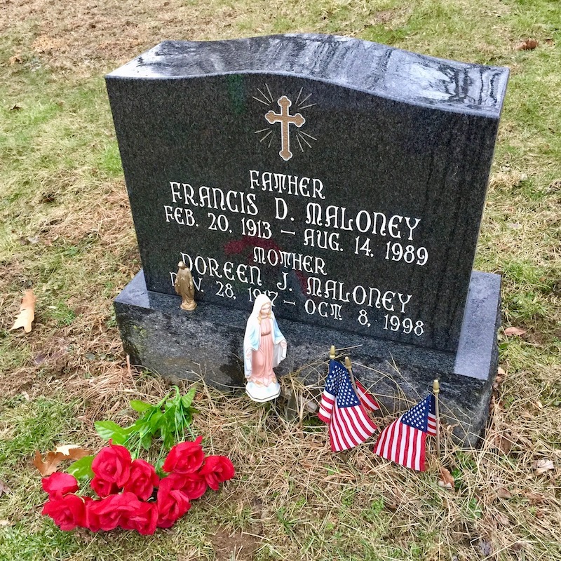 gravestone with added statue of Mary