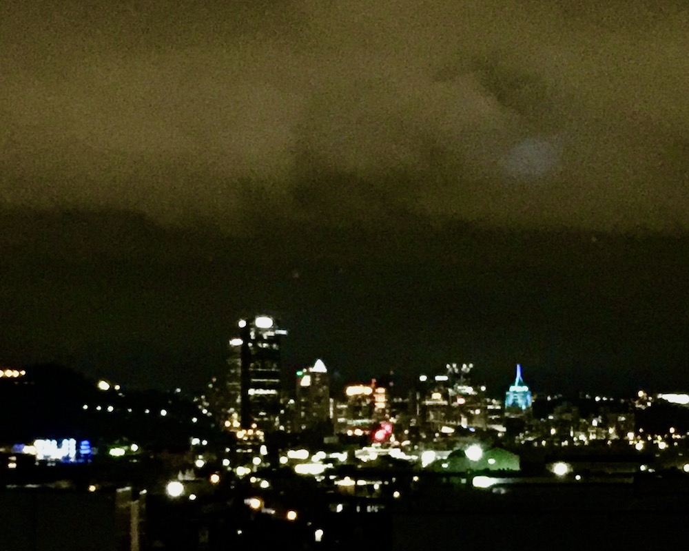 downtown Pittsburgh viewed from distace, at night