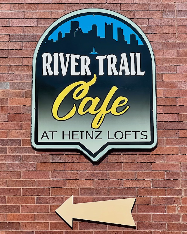 business sign with silhouette of downtown Pittsburgh skyline