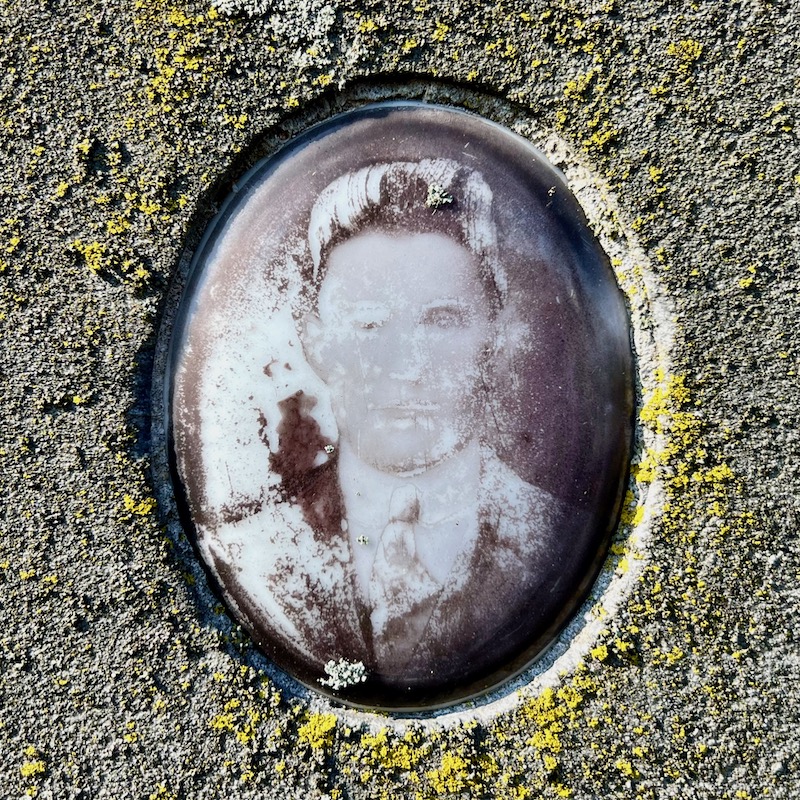 ceramic photograph inset in gravestone