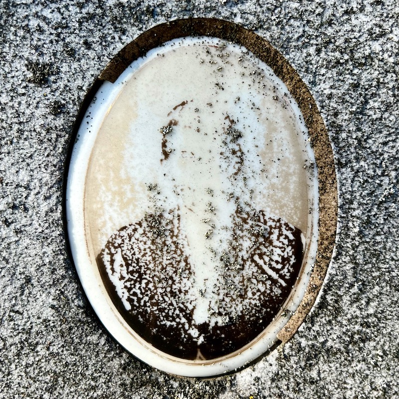 ceramic photo grave marker inset where photo is almost completely gone