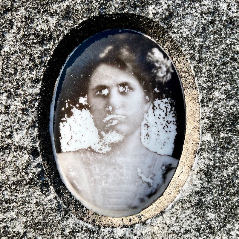 ceramic photograph inset in gravestone