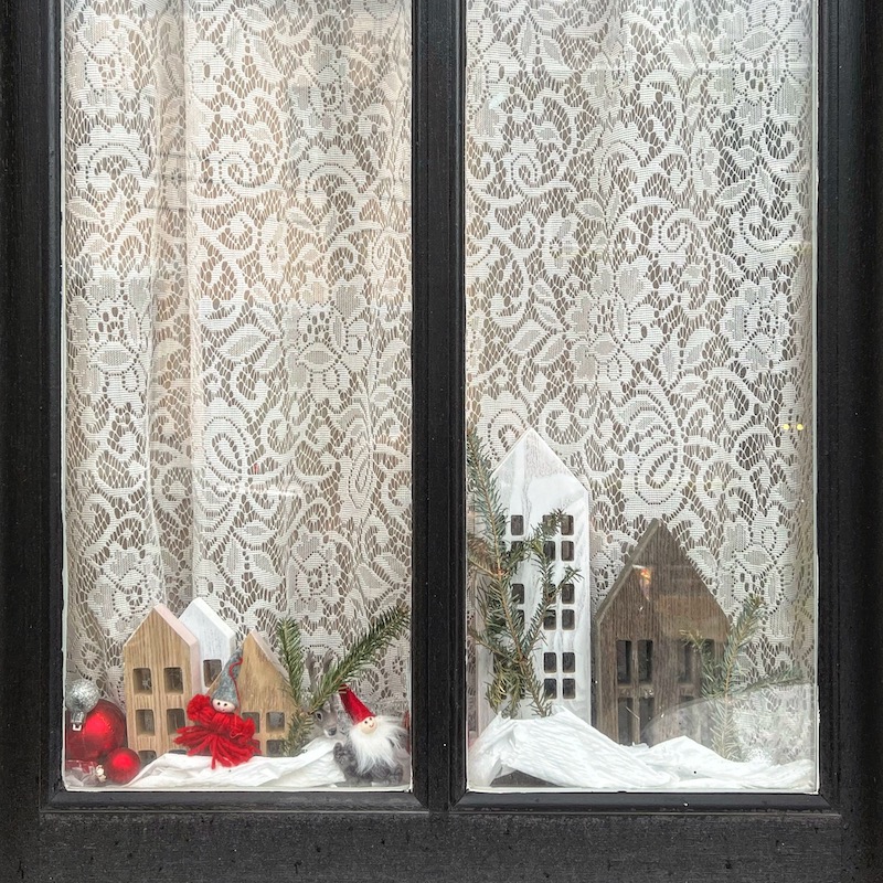 window decorated with snowy winter scene