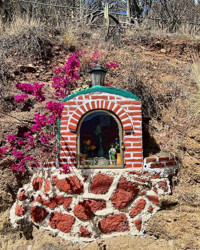 protected grotto for Mary in dry hillside