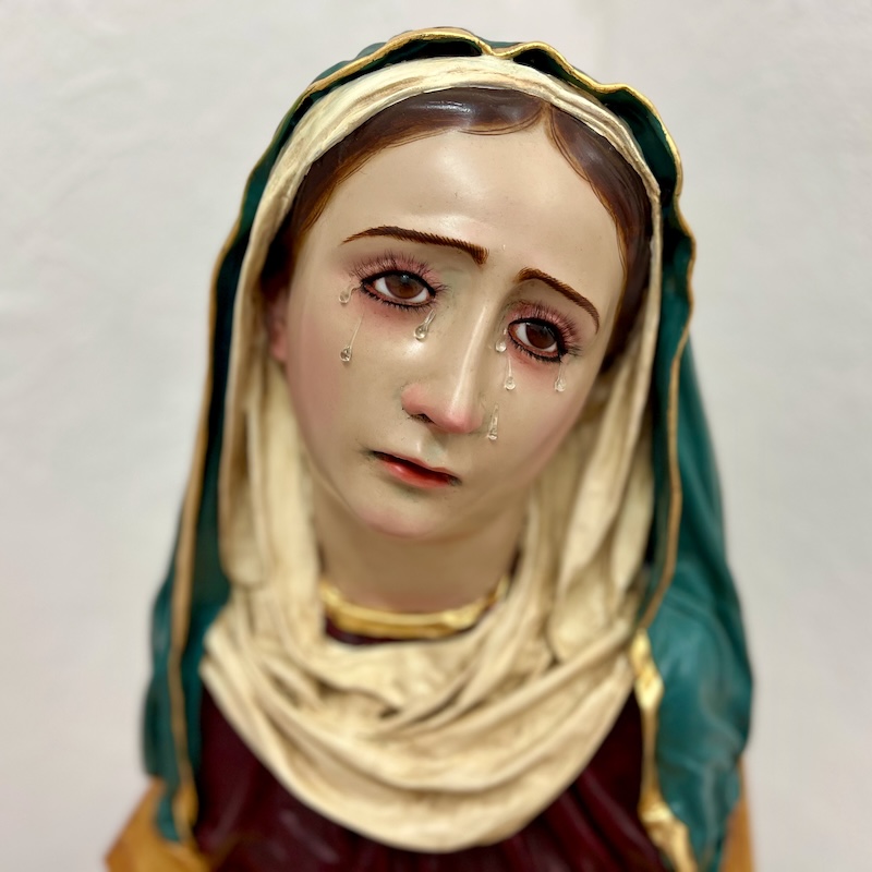 statue of Mary with tears